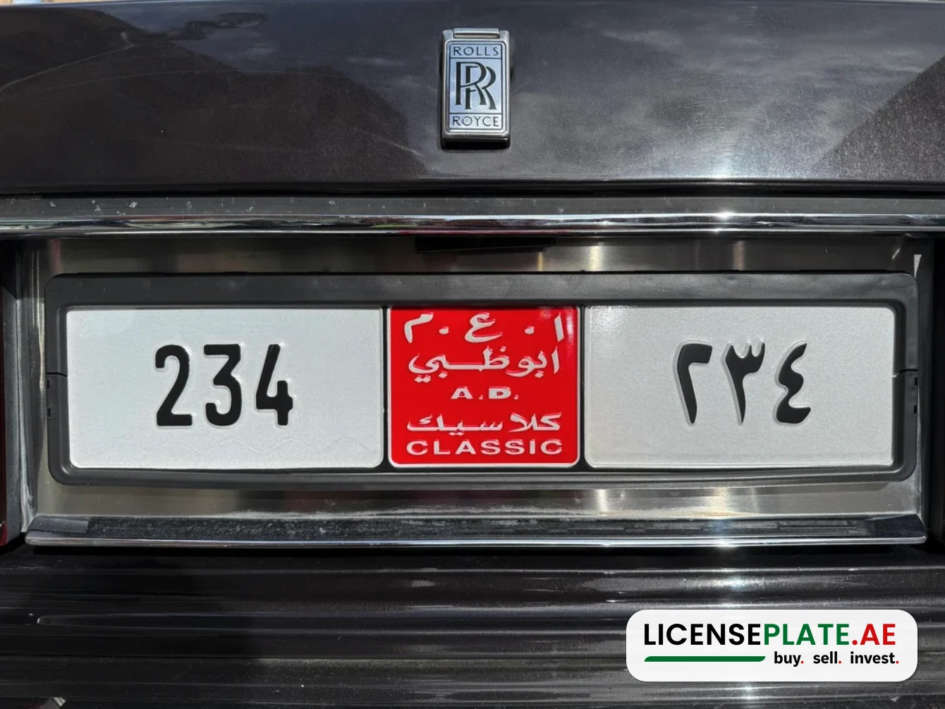 Abu Dhabi Classic number plate 234 on the boot of a Rolls-Royce Silver Spur II in London, with the red A.D. Classic panel between the Western and Arabic digits.