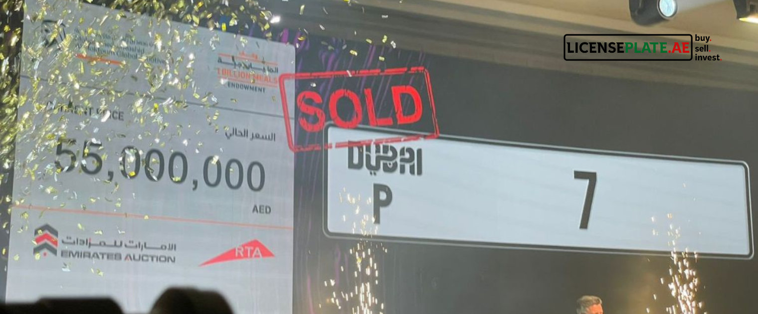 Dubai P7 number plate sold at Emirates Auction charity event for AED 55 million, showing official “SOLD” sign and luxury auction stage with confetti and RTA branding in the background.