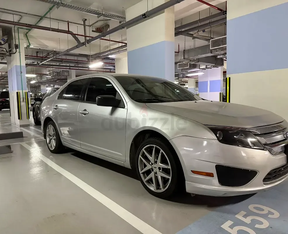 Ford Fusion 1.6 AT (101 hp)