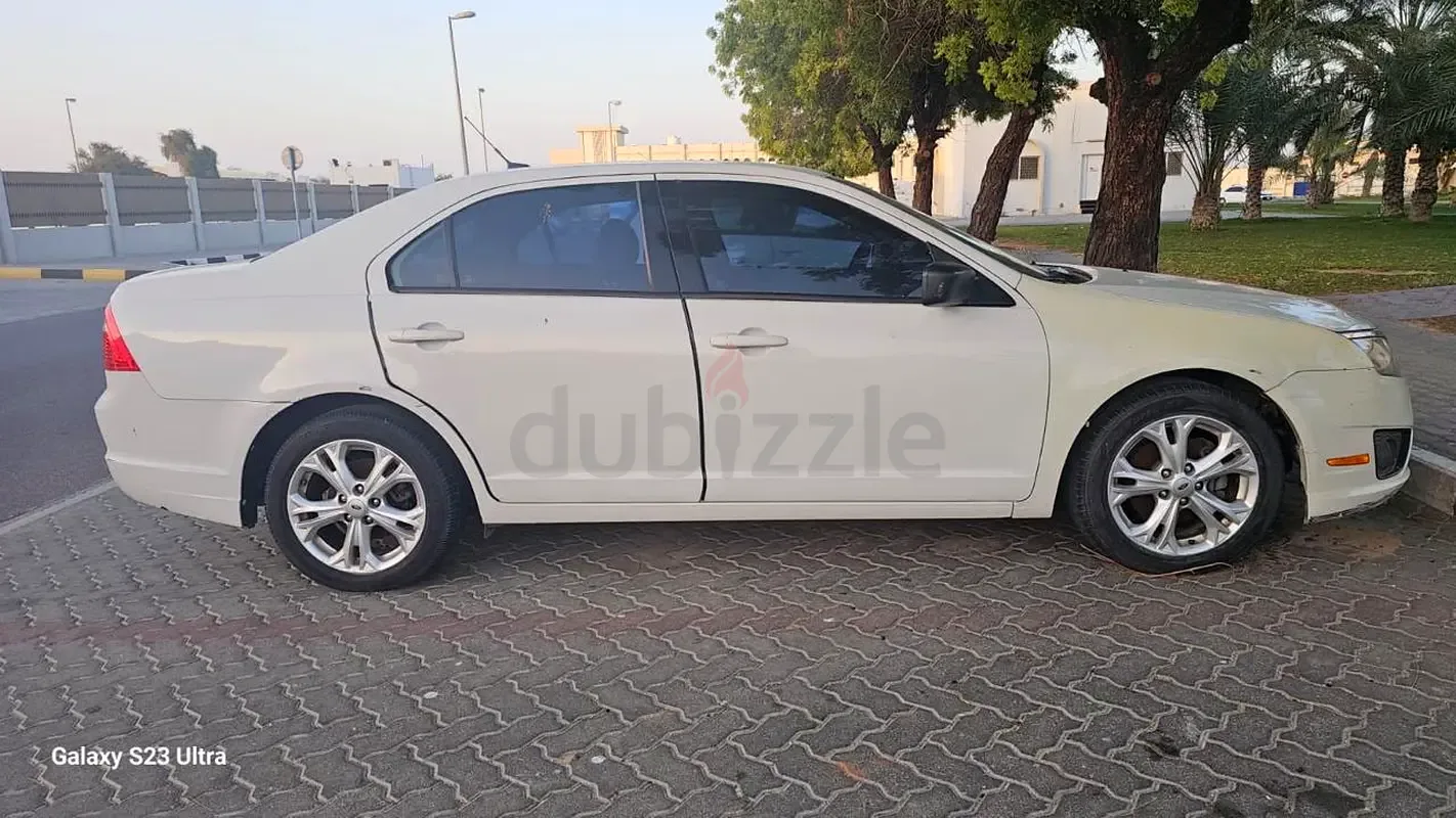 Ford Fusion 1.6 AT (101 hp)