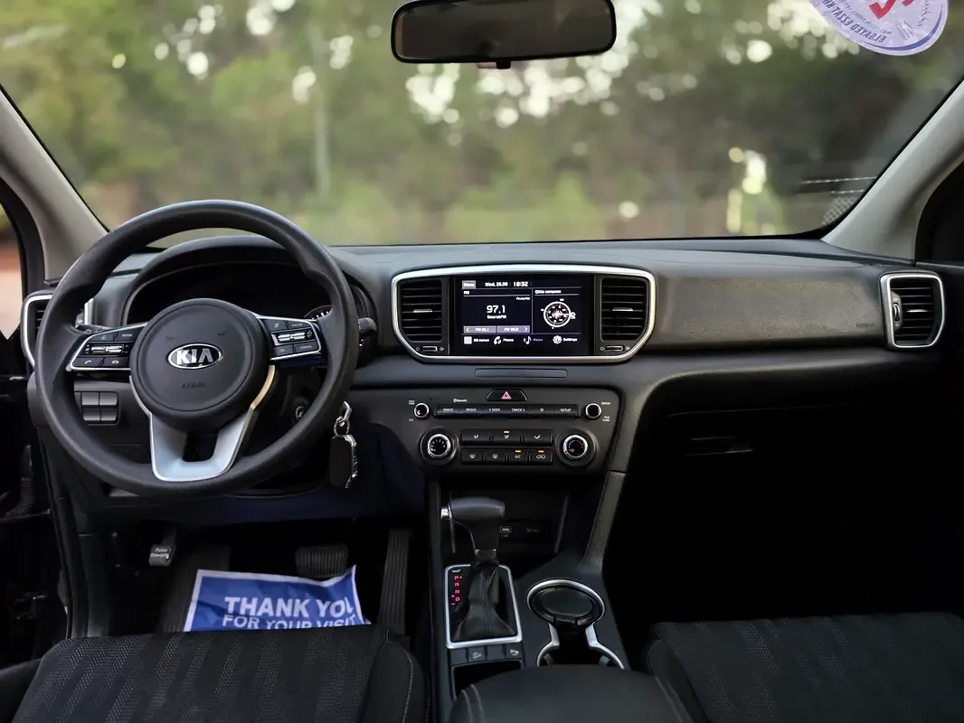Kia Sportage 2.0 AT (150 حصان) - 7