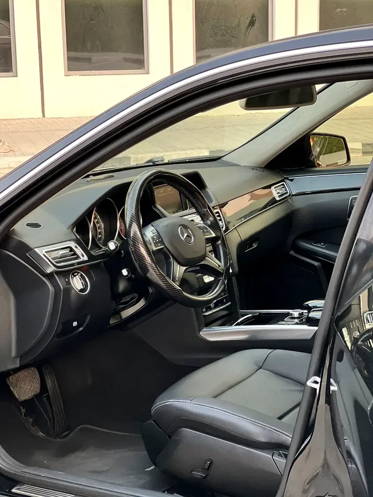 Mercedes-Benz E-Class E 200 9G-TRONIC (184 حصان) - 11