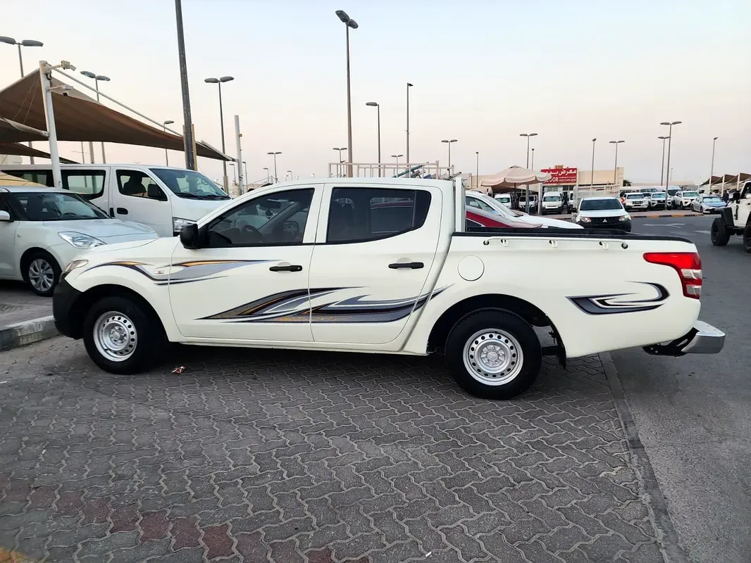 Mitsubishi L200 2.4 D MT (154 حصان) - 3