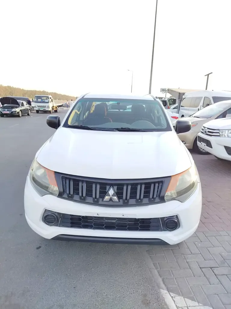 Mitsubishi L200 2.4 D MT (154 hp)