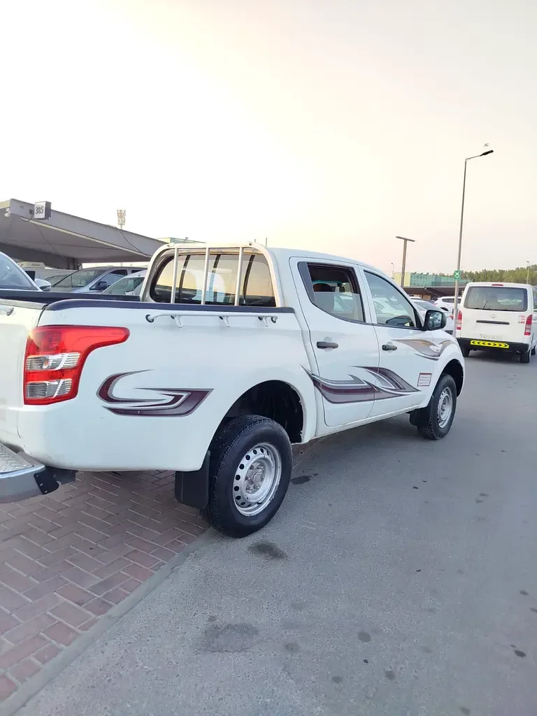 Mitsubishi L200 2.4 D MT (154 حصان) - 6