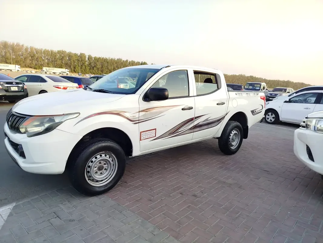 Mitsubishi L200 2.4 D MT (154 حصان) - 7