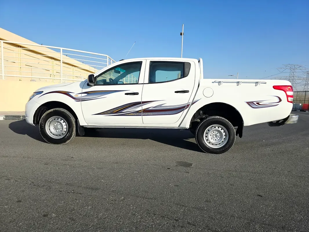 Mitsubishi L200 2.4 D MT (154 حصان) - 2