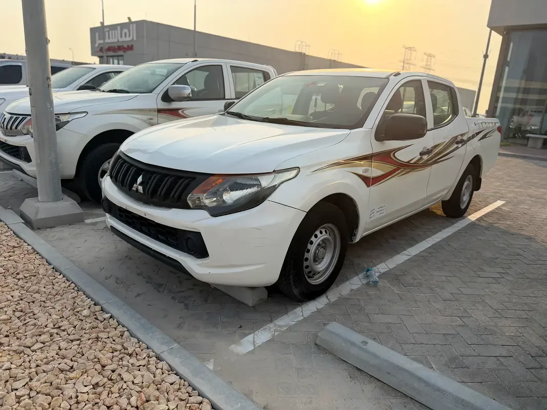 Mitsubishi L200 2.4 MT (128 hp)