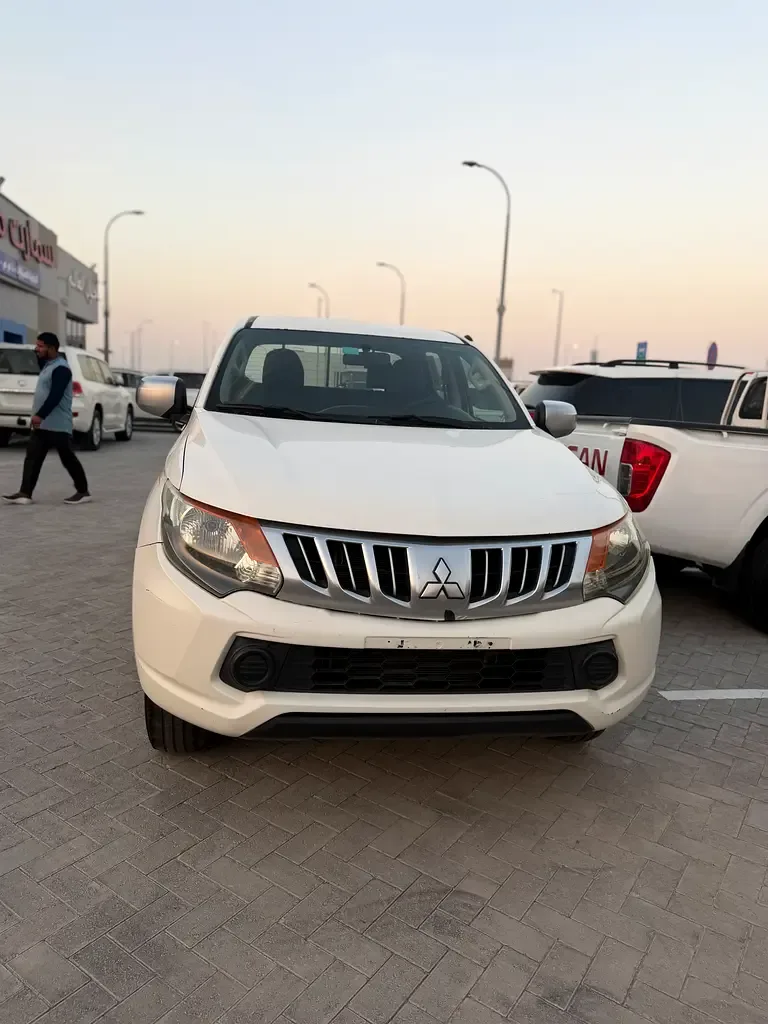 Mitsubishi L200 2.4 MT (128 hp)