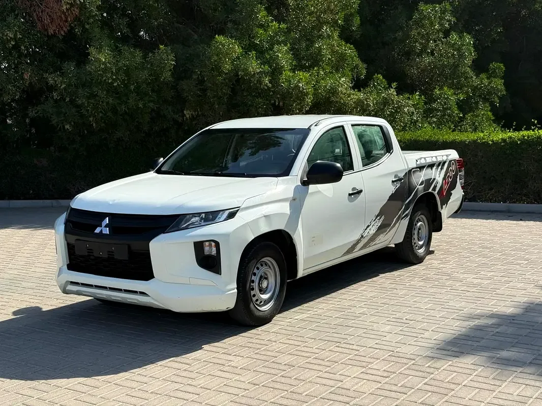Mitsubishi L200 2.4 MT (128 hp)