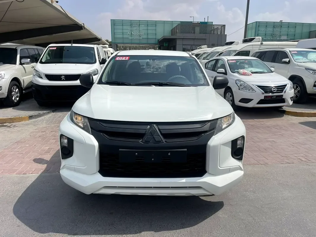 Mitsubishi L200 2.4 MT (128 حصان) - 2