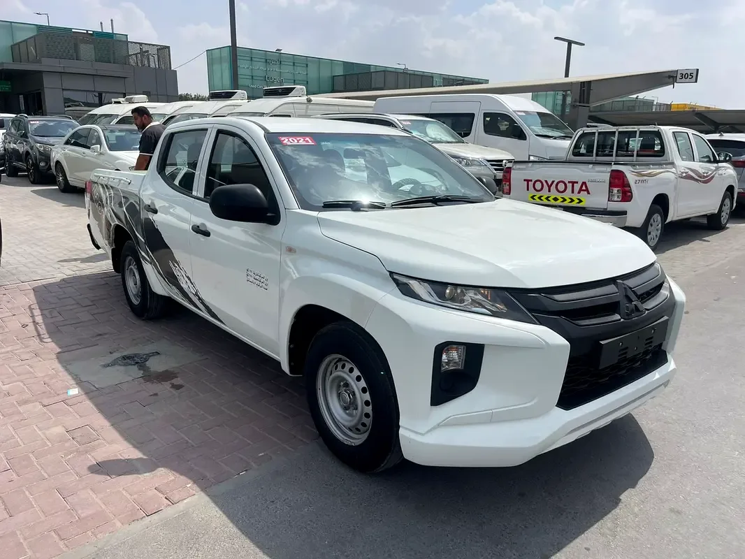 Mitsubishi L200 2.4 MT (128 hp)