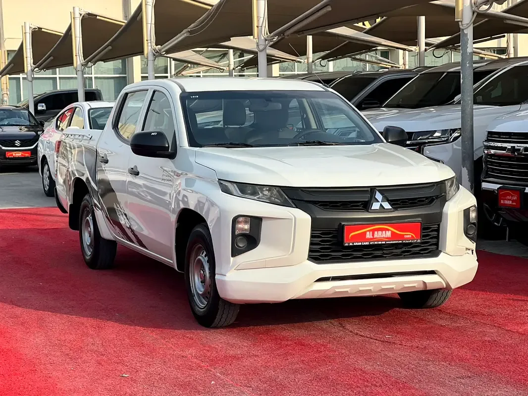 Mitsubishi L200 2.4 MT (128 hp)