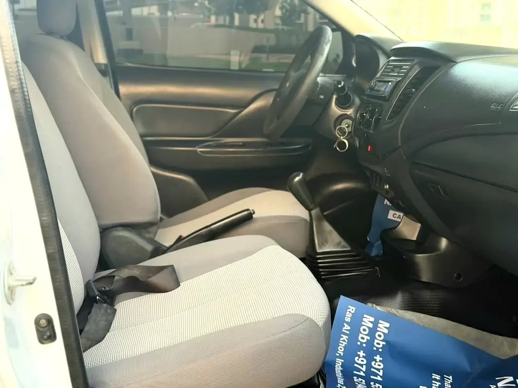 Mitsubishi L200 2.4 MT (128 hp) - 6