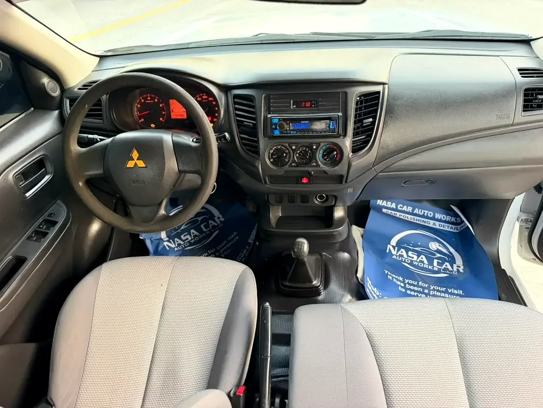 Mitsubishi L200 2.4 MT (128 hp) - 9