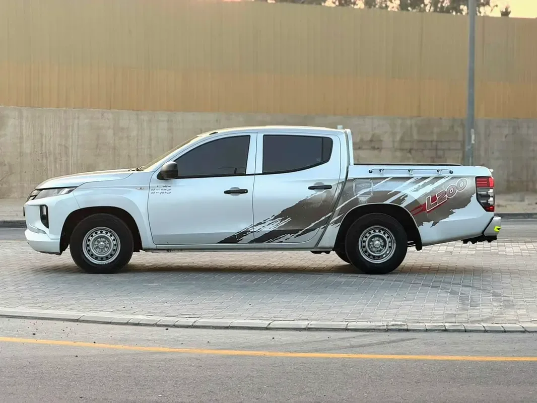 Mitsubishi L200 2.4 MT (128 hp) - 13
