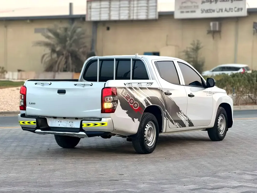 Mitsubishi L200 2.4 MT (128 hp) - 11