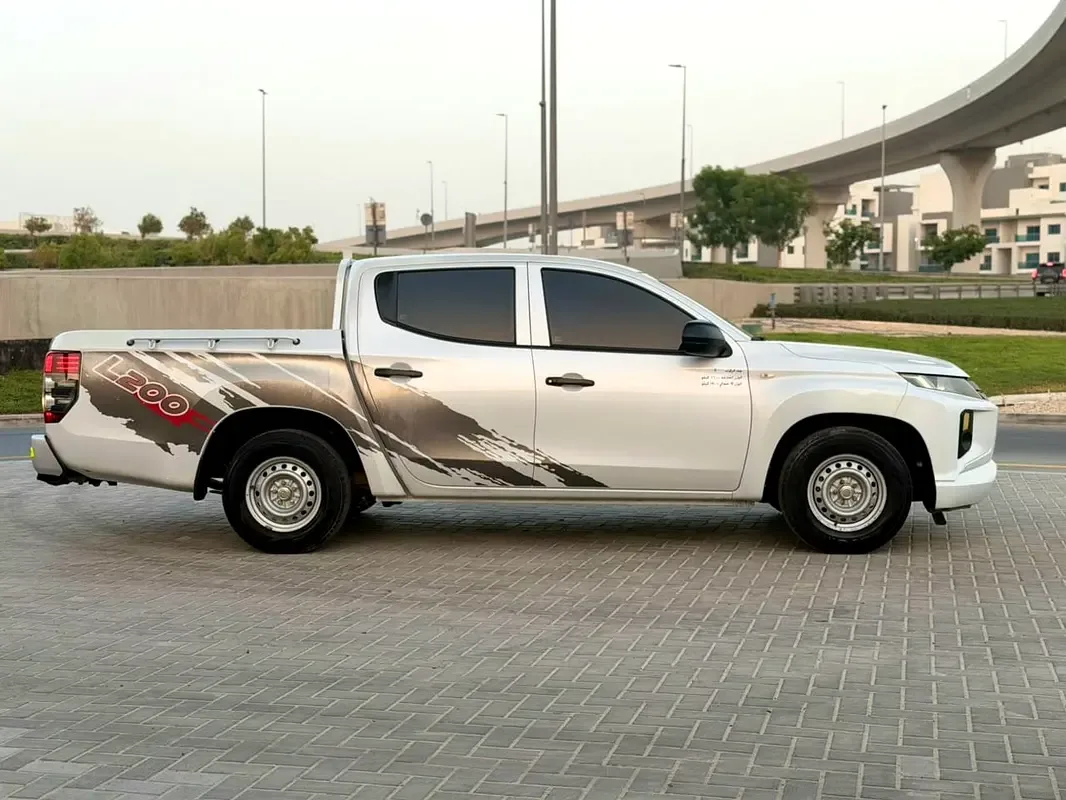 Mitsubishi L200 2.4 MT (128 hp) - 14