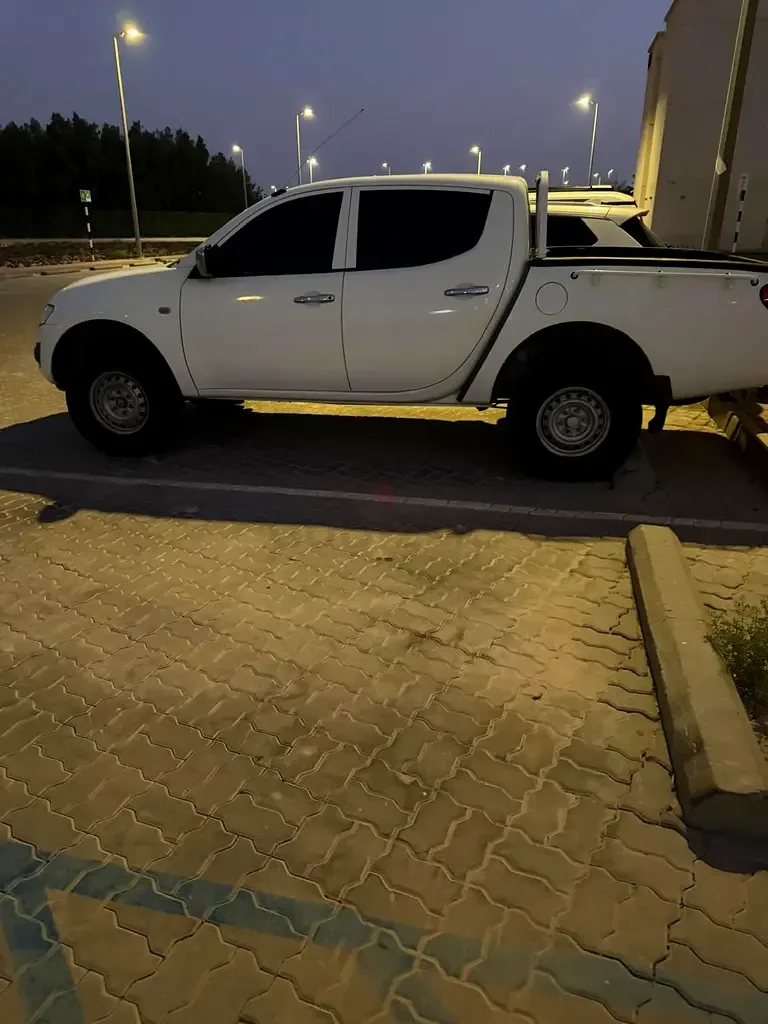 Mitsubishi L200 2.4 MT (139 حصان) - 2