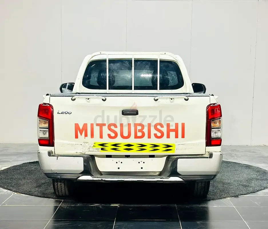 Mitsubishi L200 2.4 MT (150 حصان) - 11