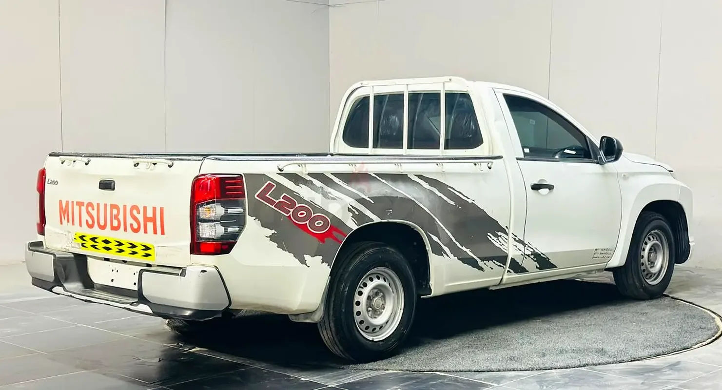 Mitsubishi L200 2.4 MT (150 حصان) - 12