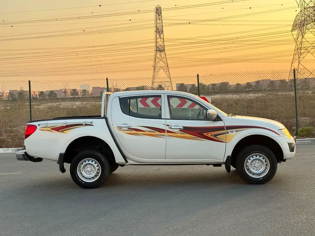 Mitsubishi L200 2.5 D MT RWD (90 hp) - 2