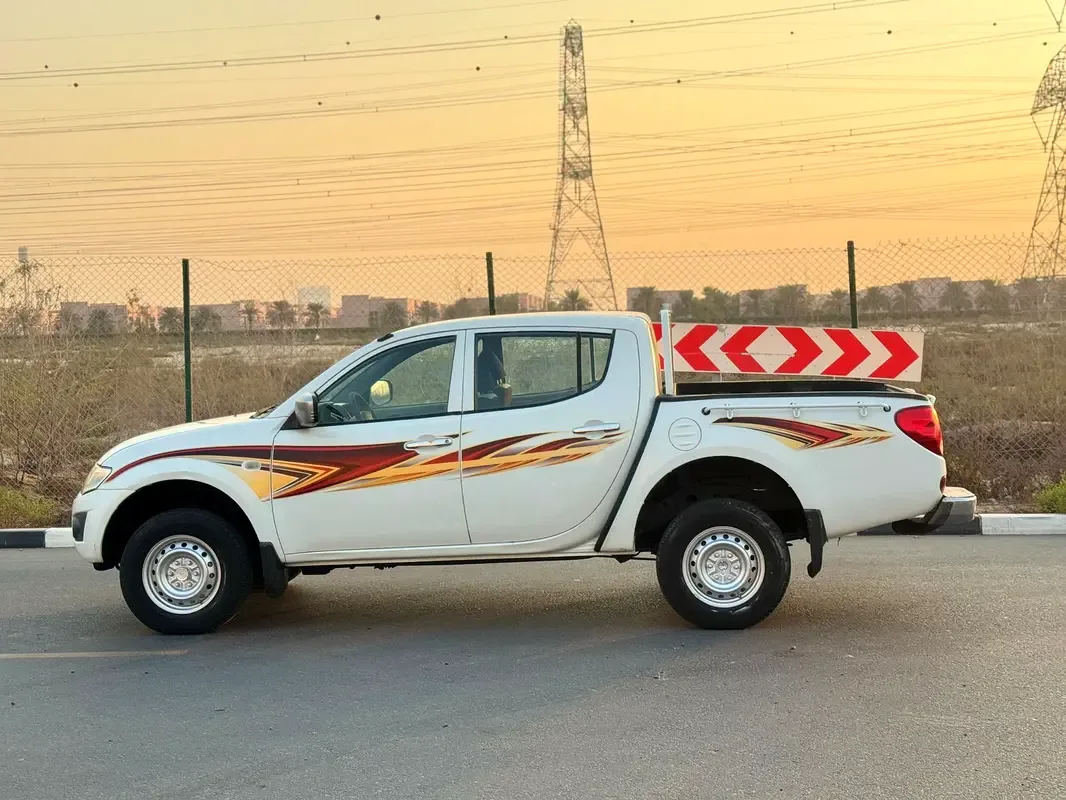 Mitsubishi L200 2.5 D MT RWD (90 hp) - 4
