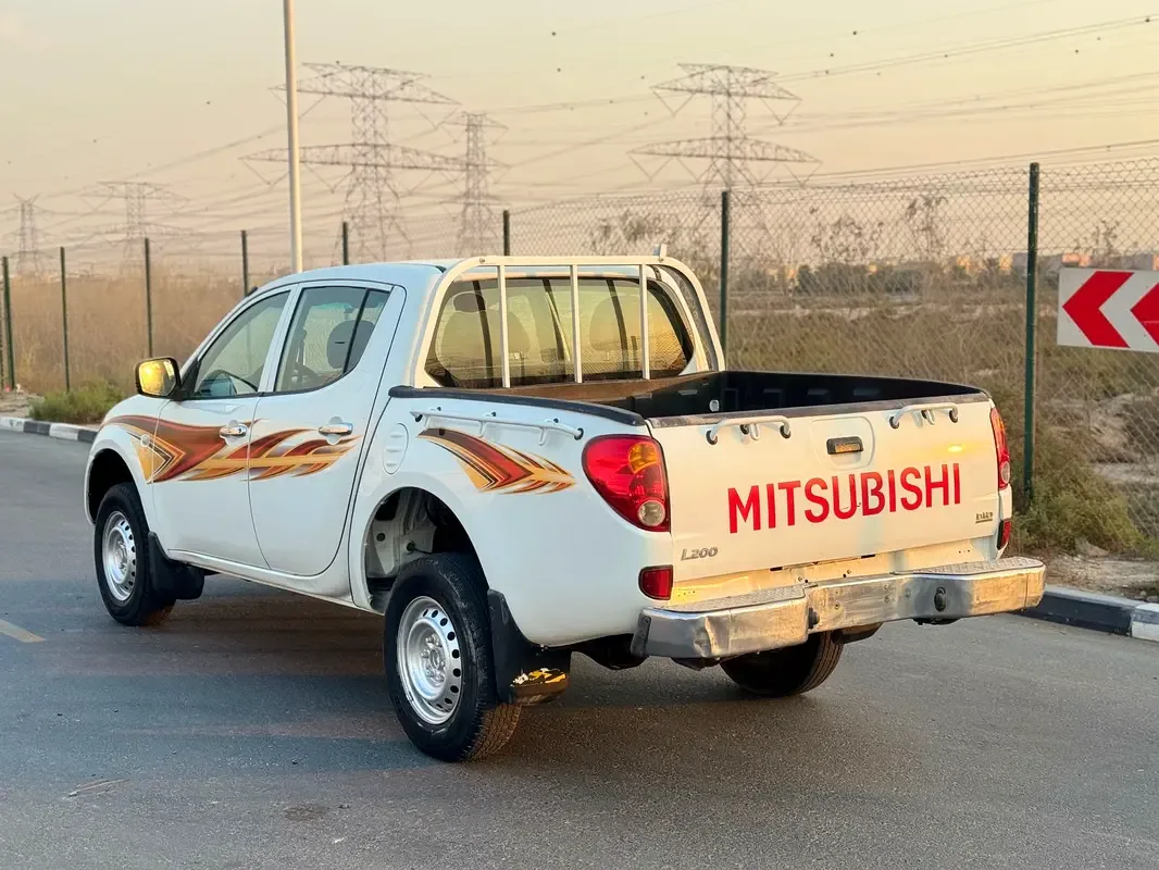 Mitsubishi L200 2.5 D MT RWD (90 hp) - 10