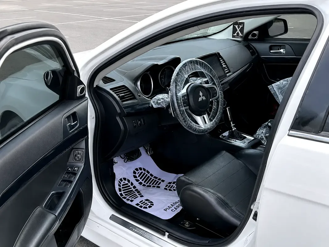 Mitsubishi Lancer Evolution 2.0 AMT AWD (295 حصان) - 6
