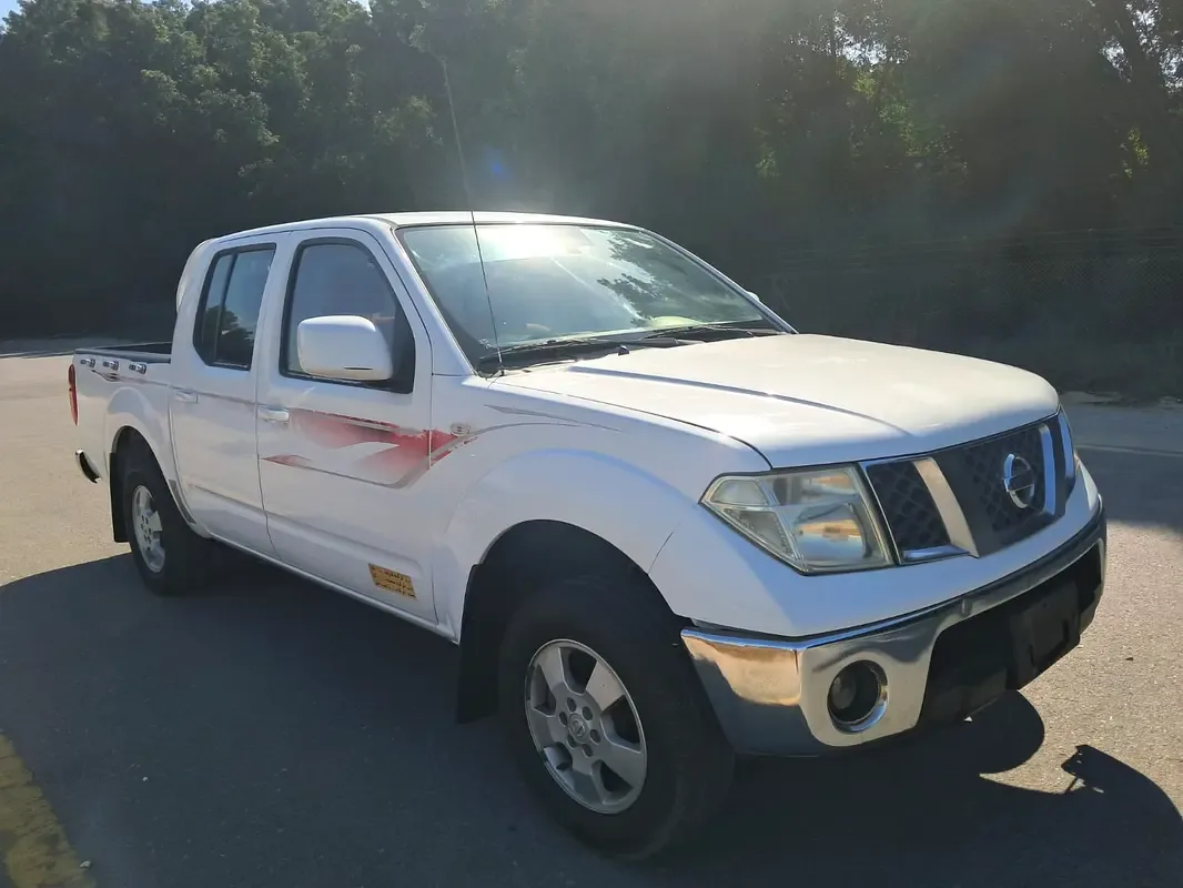 Nissan Navara (Frontier) 2.5 AT (152 hp)
