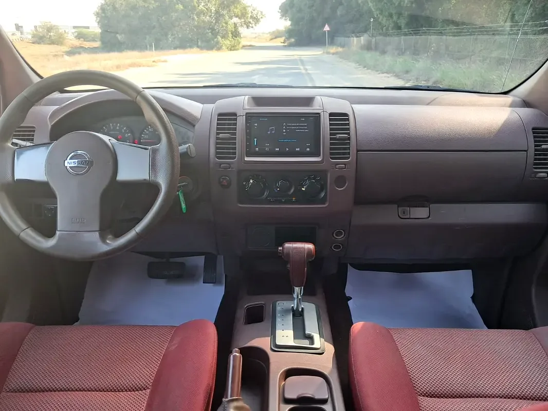 Nissan Navara (Frontier) 2.5 AT (152 hp) - 2