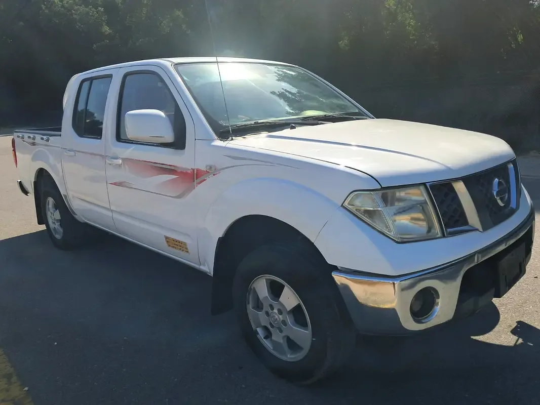 Nissan Navara (Frontier) 2.5 AT (152 hp) - 11