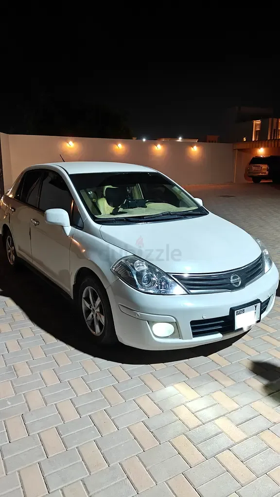 Nissan Tiida 1.6 AT (110 hp)