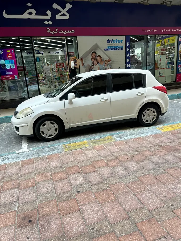 Nissan Tiida 1.6 AT (110 hp)