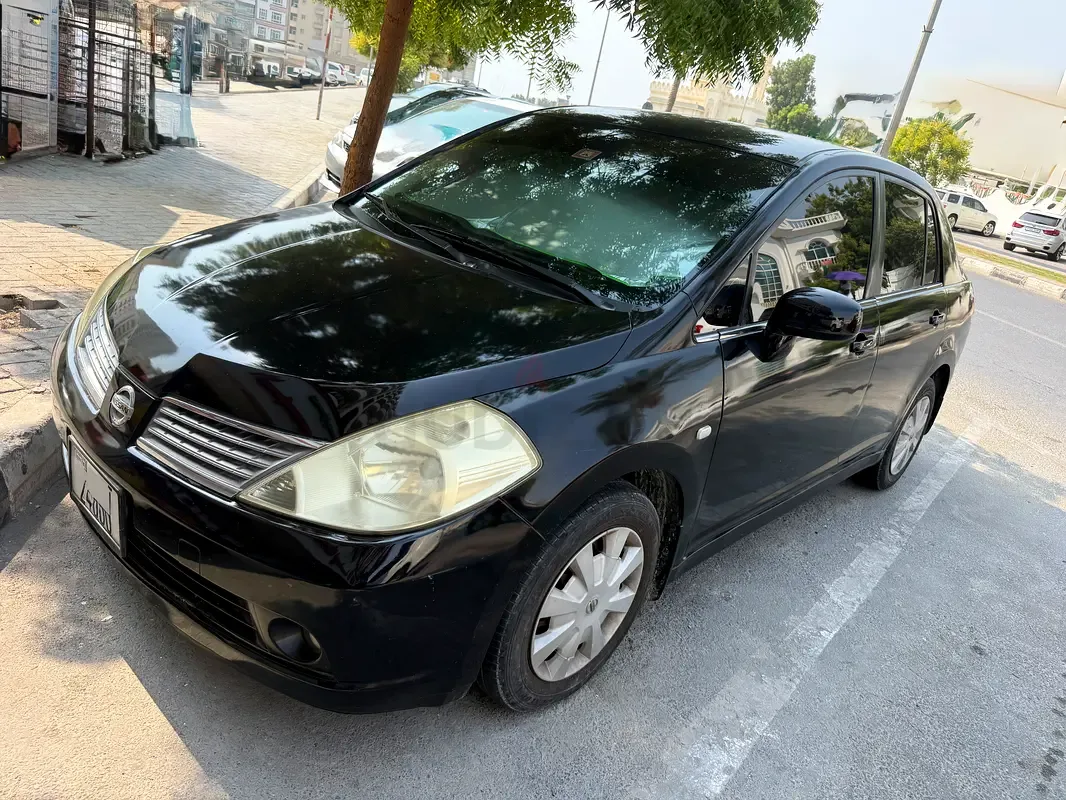 Nissan Tiida 1.6 AT (110 hp)