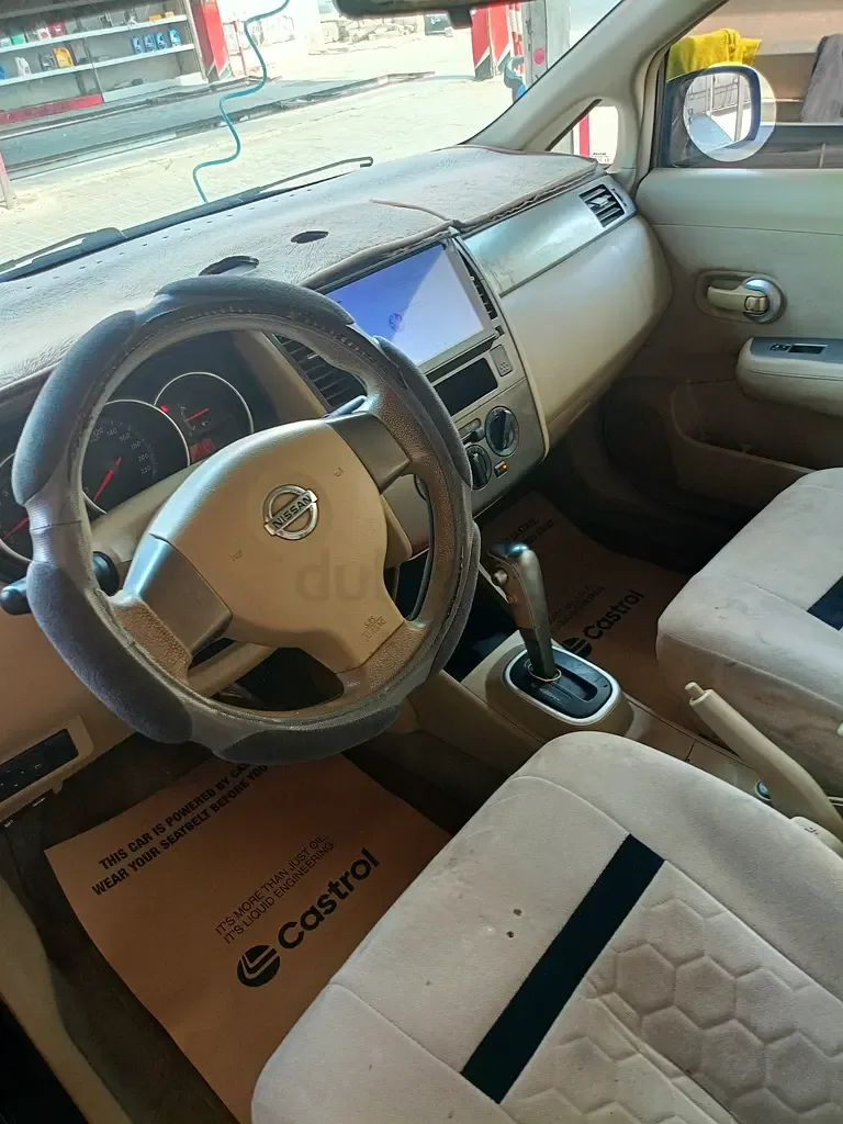 Nissan Tiida 1.6 AT (110 hp)