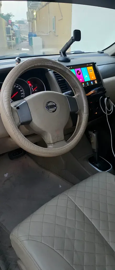 Nissan Tiida 1.6 AT (110 hp) - 13