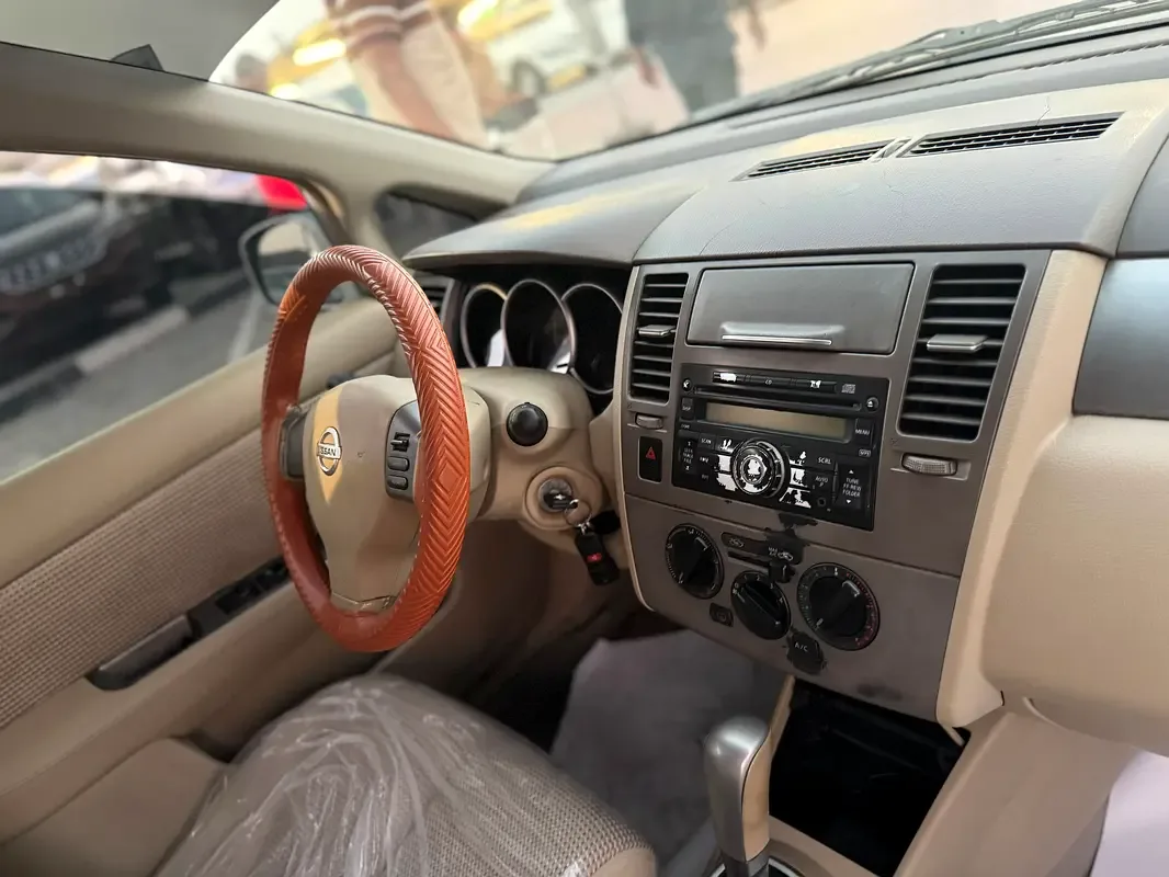 Nissan Tiida 1.6 AT (110 hp) - 10