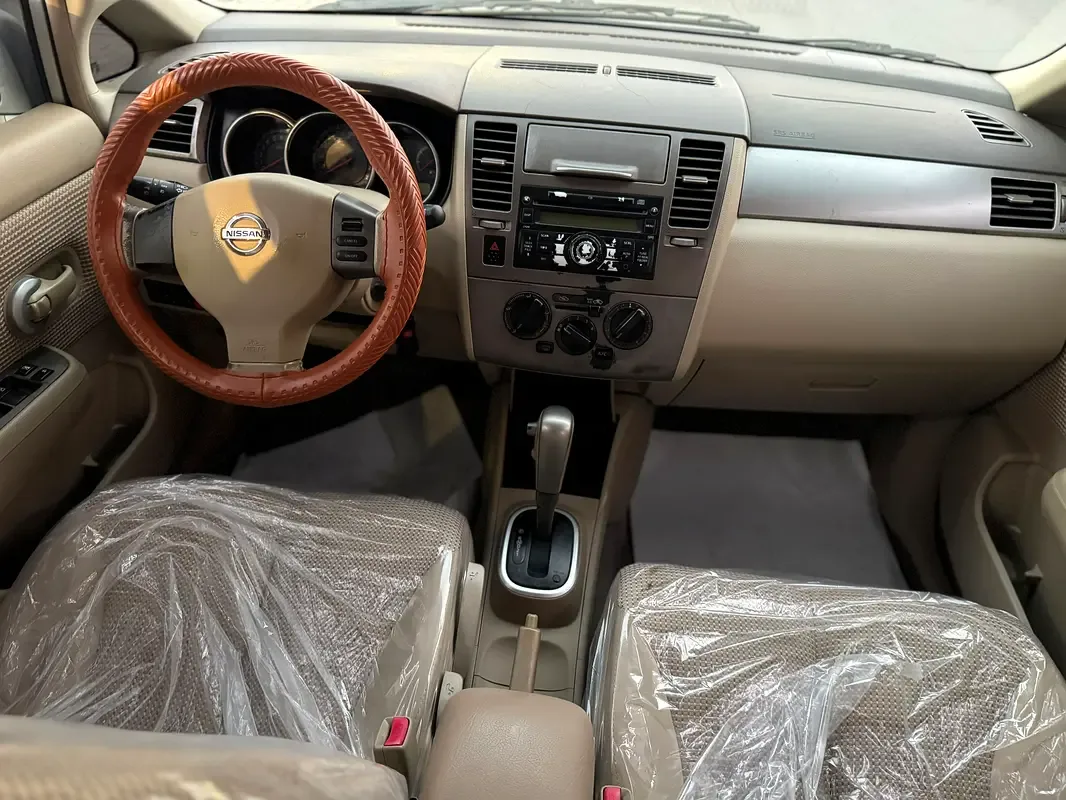 Nissan Tiida 1.6 AT (110 hp) - 12