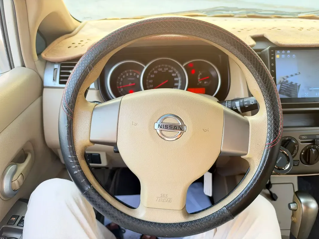 Nissan Tiida 1.6 AT (110 حصان) - 8