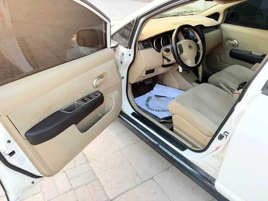 Nissan Tiida 1.6 AT (110 حصان) - 11