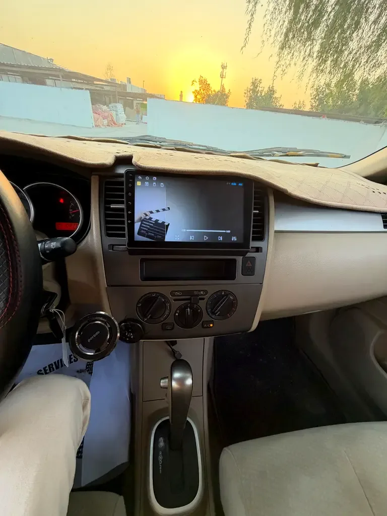 Nissan Tiida 1.6 AT (110 حصان) - 13