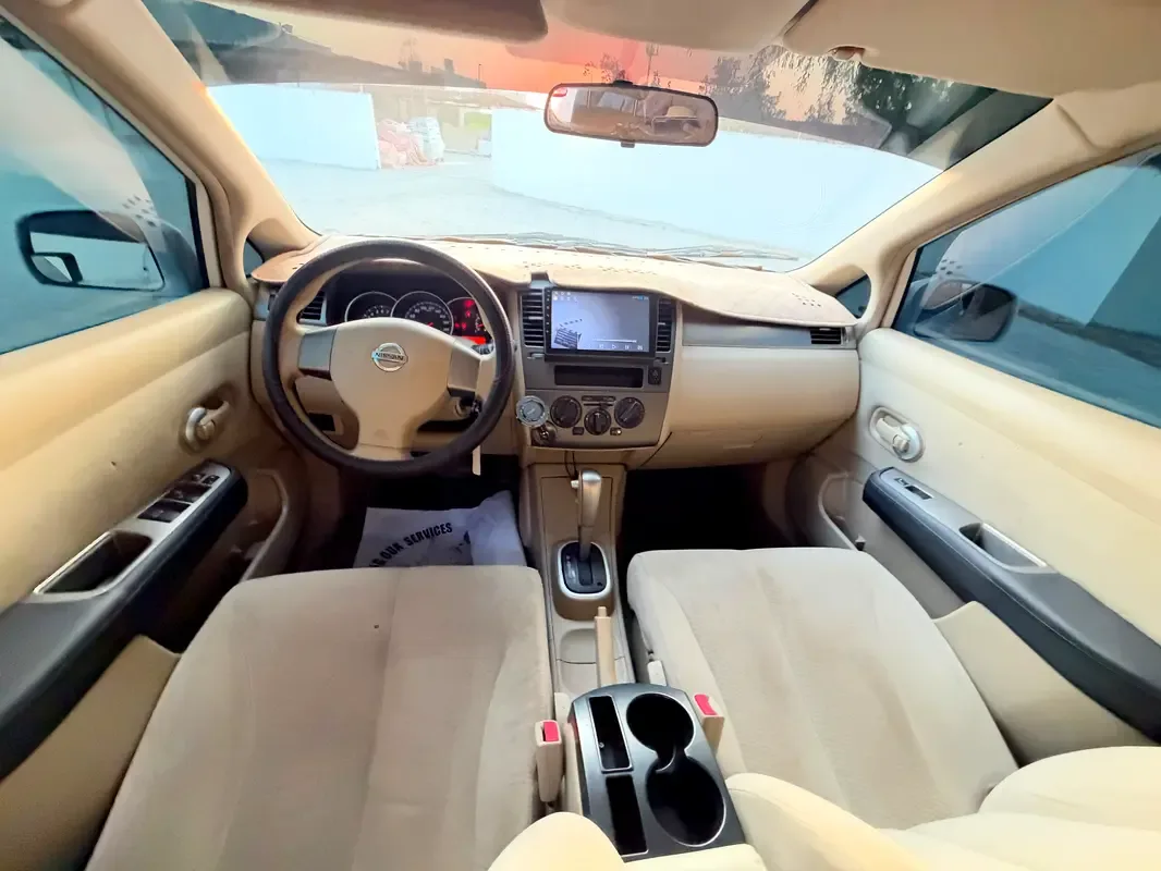 Nissan Tiida 1.6 AT (110 حصان) - 15