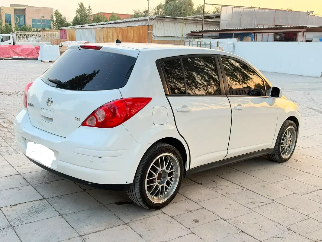 Nissan Tiida 1.6 AT (110 حصان) - 16