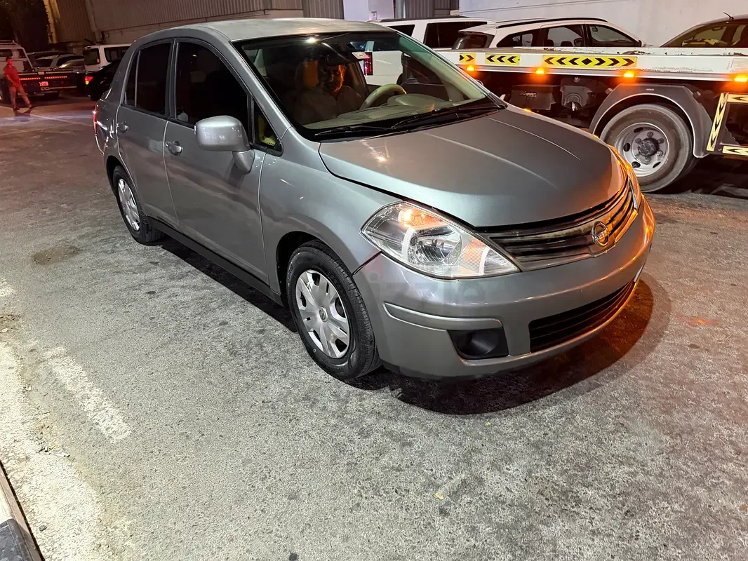 Nissan Tiida 1.6 AT (110 حصان) - 2