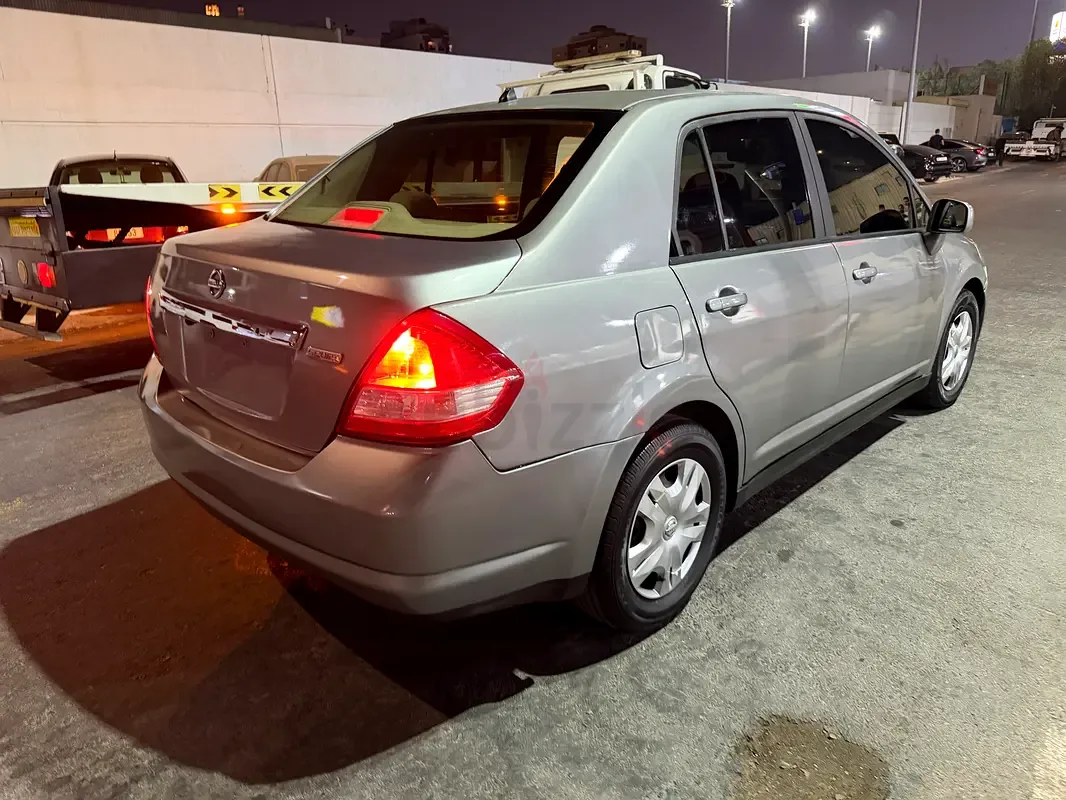 Nissan Tiida 1.6 AT (110 حصان)