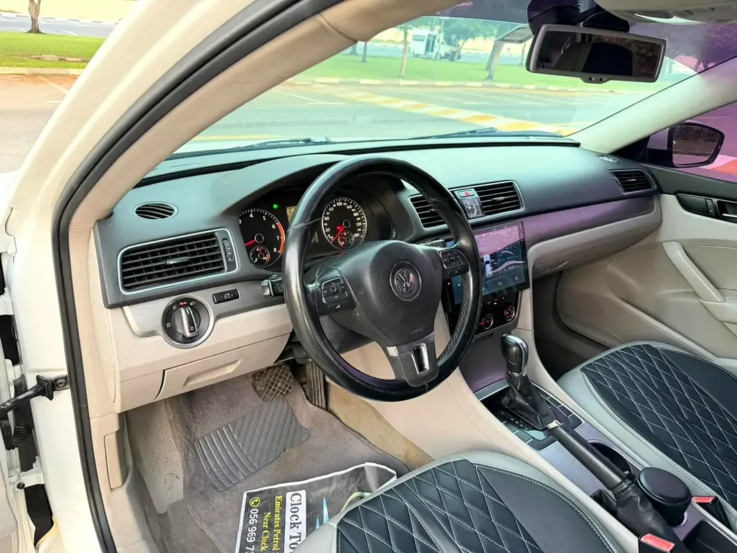 Volkswagen Passat 1.4 AMT (125 حصان) - 2